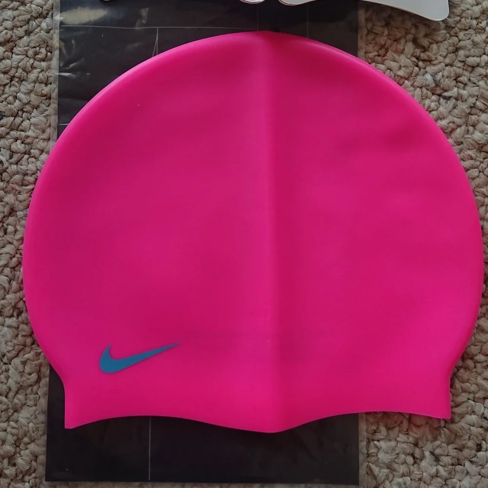 Nike Silicone Youth Swim Cap in pink for ages 8-14